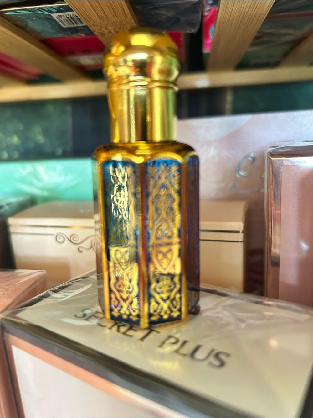 Small Ornate glass perfume container.